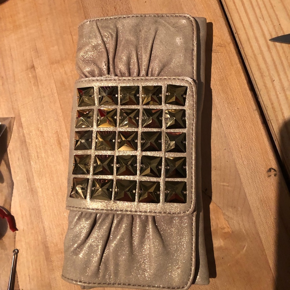 Sexy Stuart Wietzman gold clutch